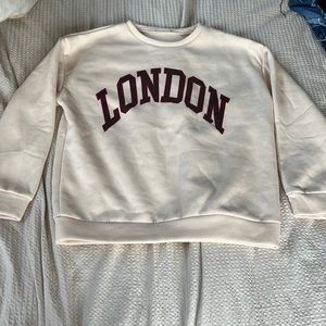 Cream sweatshirt with London writing